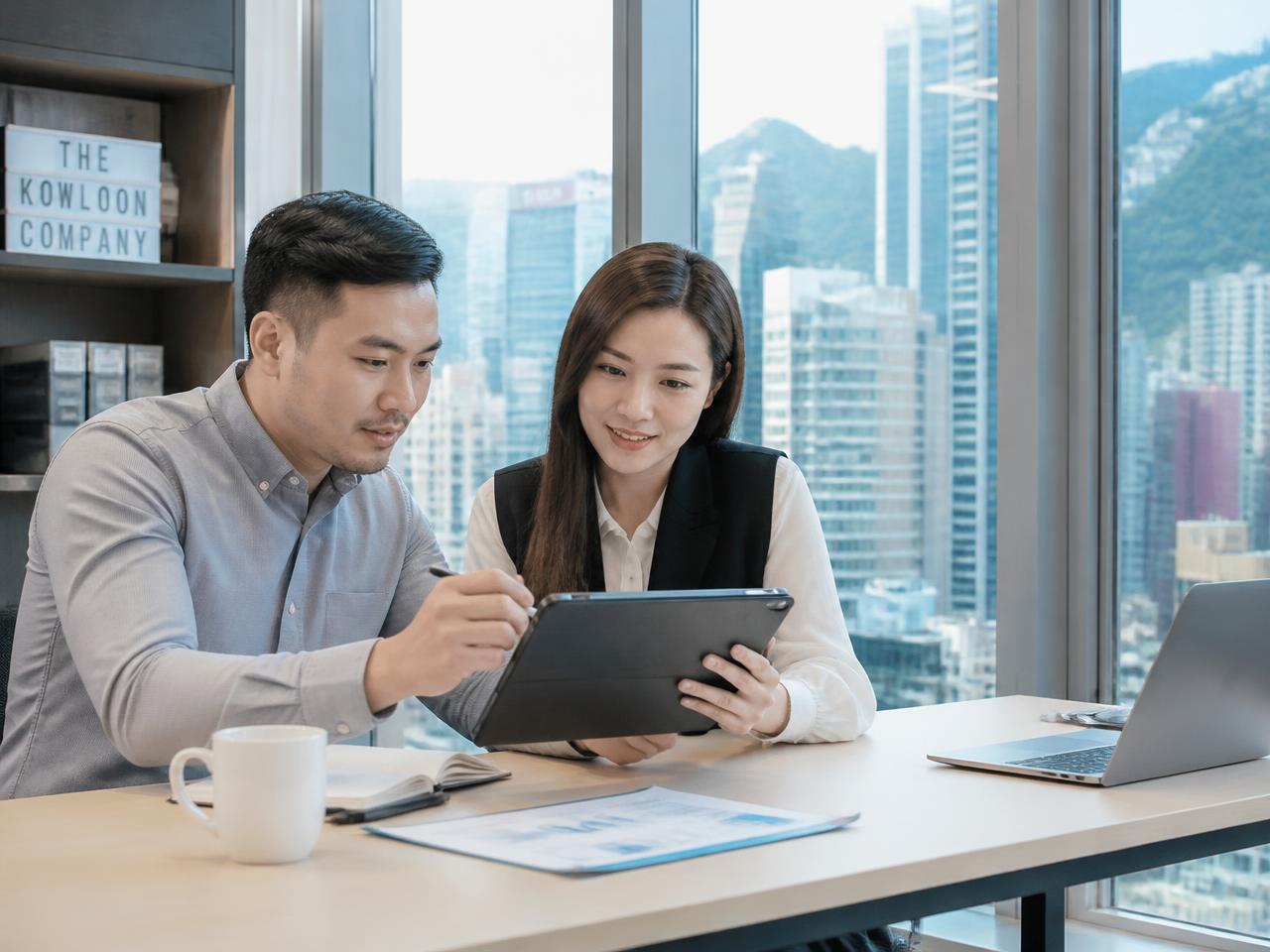 Diglory Limited account team reviewing stock availability in the Hong Kong office